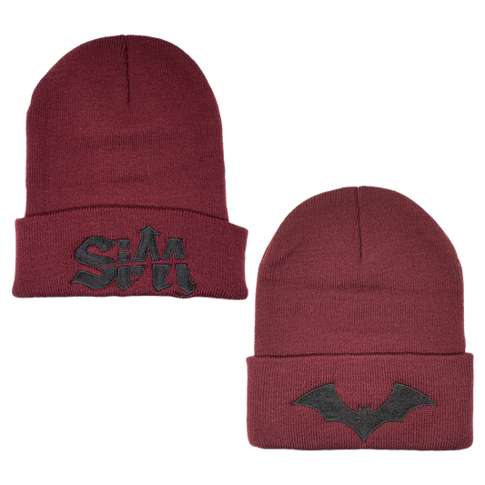 A maroon red beanie with embroidered SIM logo and bat design.